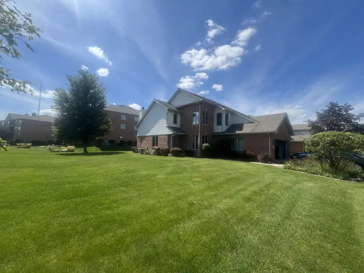 Wide Striped Lawn Apartment Building Multi Family Chicagoland