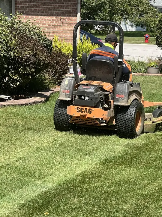 Zero Turn Mower On Striped Lawn Chicagoland